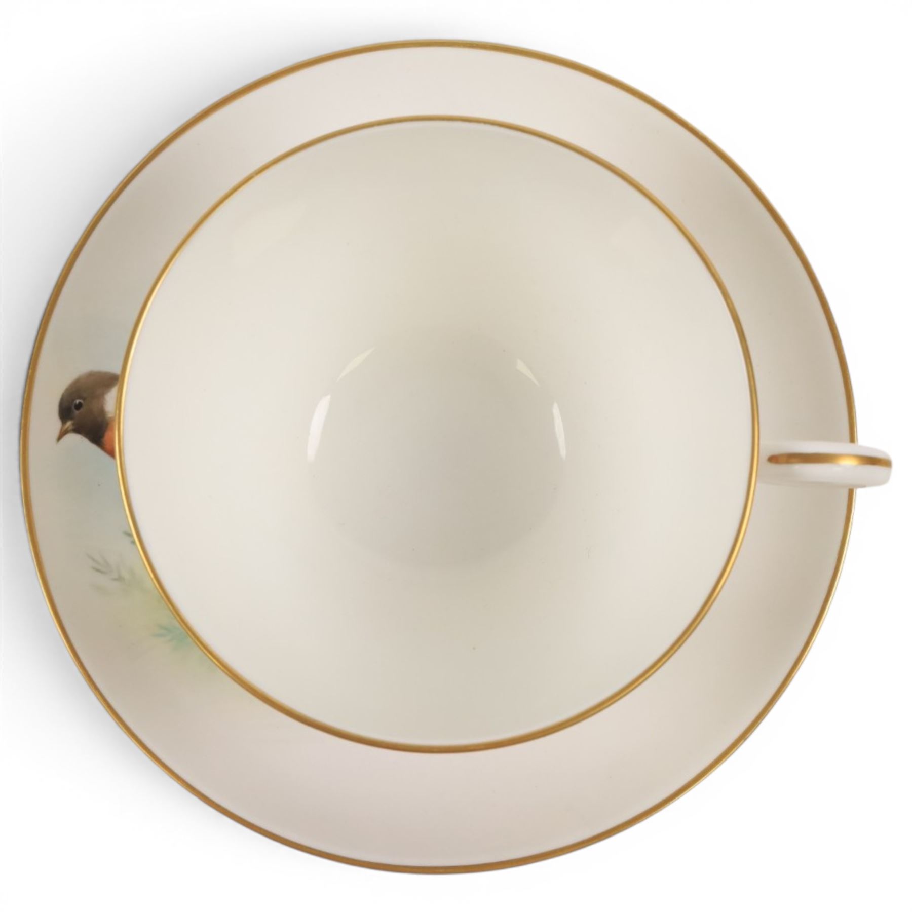 Royal Worcester large novelty cup and saucer, each hand pained, the cup with grouse, the saucer with stonechat