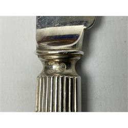 Victorian silver plated dessert set by Elkington & Co for twelve place settings, each reeded handle with vacant cartouche, each with Elkington & Co mark, date letter for 1861, and registration lozenge, contained within a mahogany case with vacant brass cartouche to the hinged cover, opening to reveal a Royal blue baize lined interior with removable tray, case H6cm W29.5cm D26.5cm