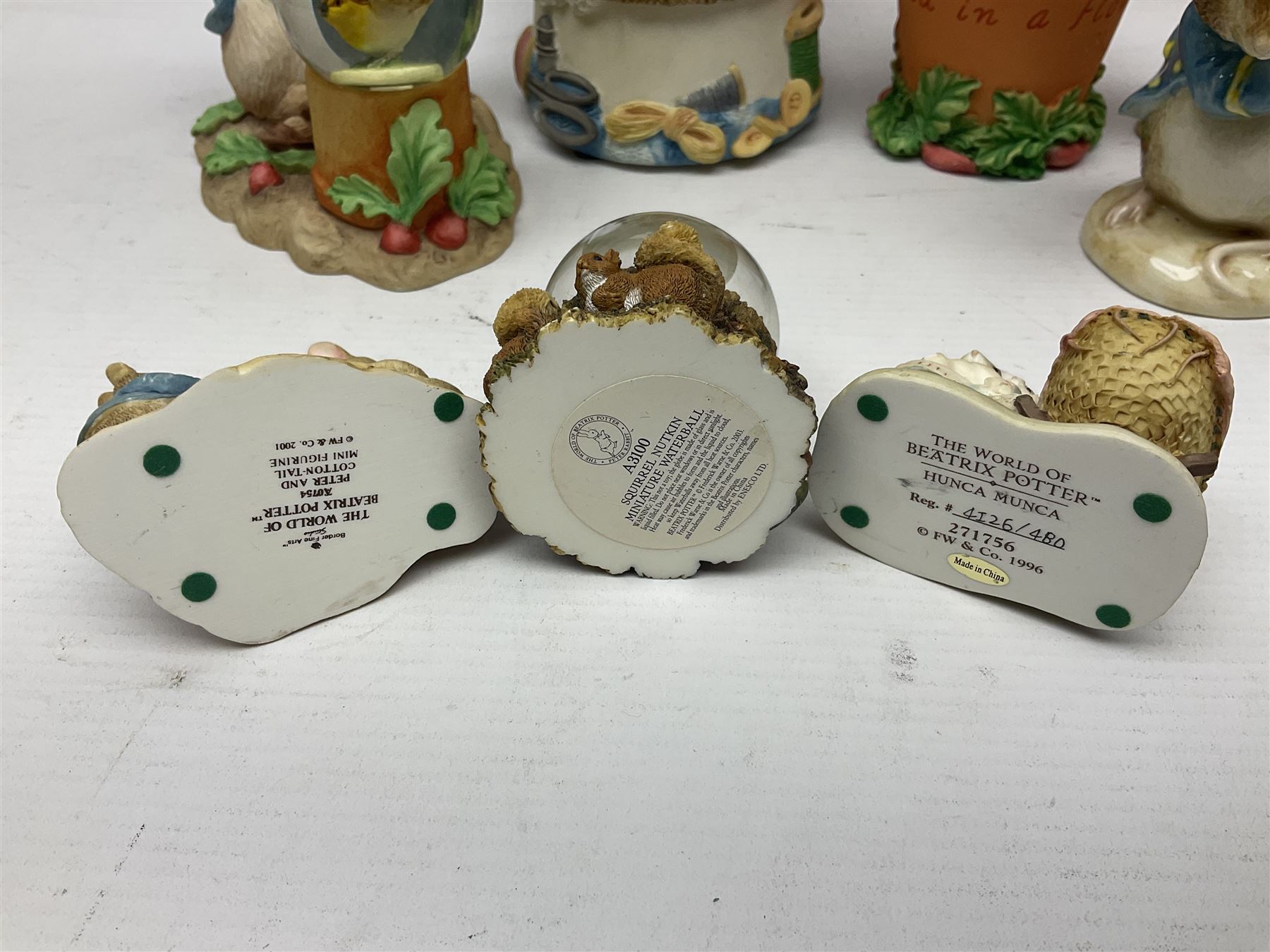 Twelve Border Fine Arts The World of Beatrix Potter and Peter Rabbit Collection figures, including Musical Tailor of Gloucester, Peter Rabbit with Miniature Waterball, Peter Hid in a Flowerpot trinket box, Jemima Puddle Duck with Herbs and Gentleman Mouse, etc