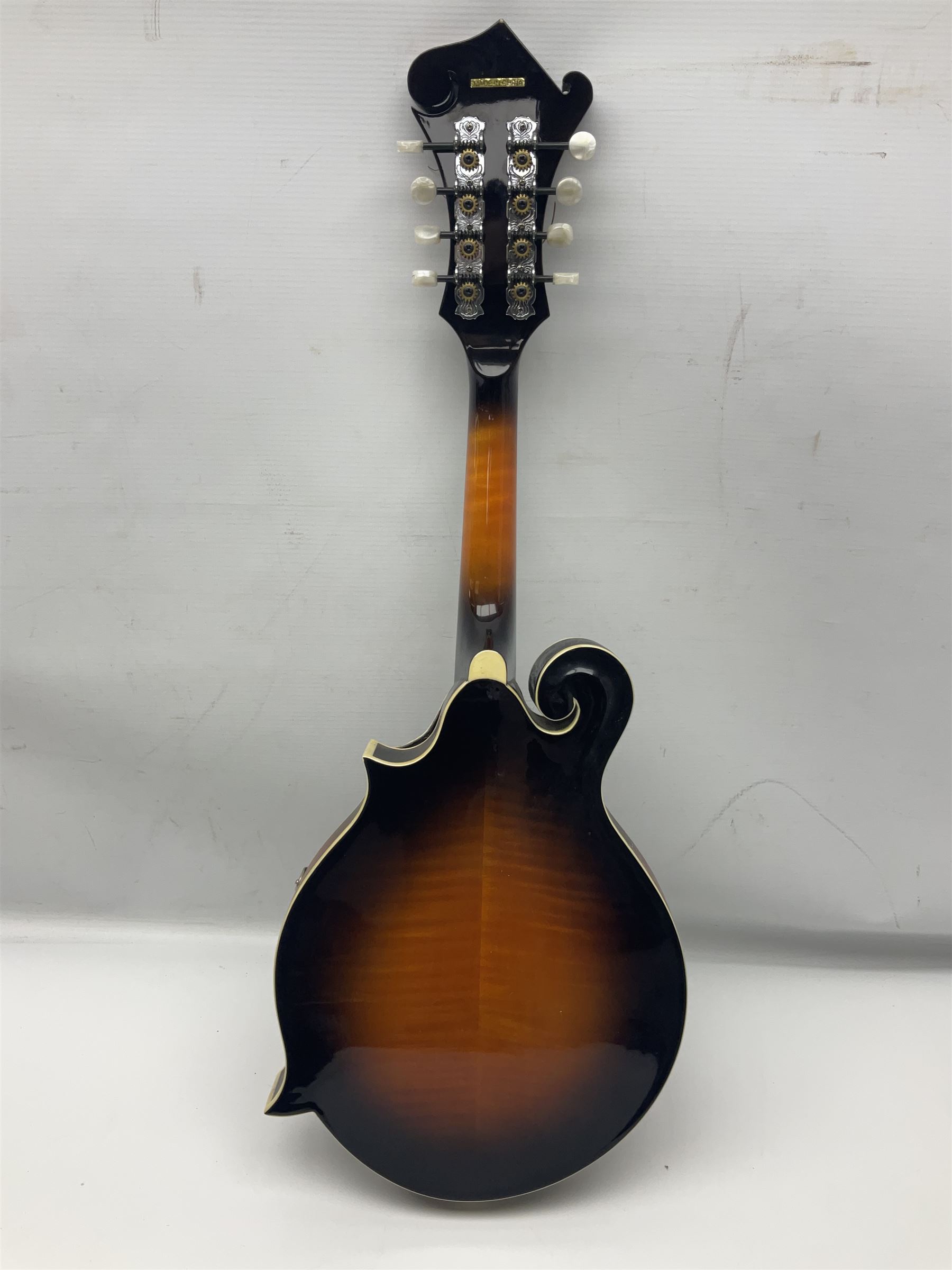 Ashbury F-Model eight-string mandolin, model no.IMF-150 with two-piece maple back and ribs and sunburst top, mother-of-pearl inlay; bears maker's label; L69cm