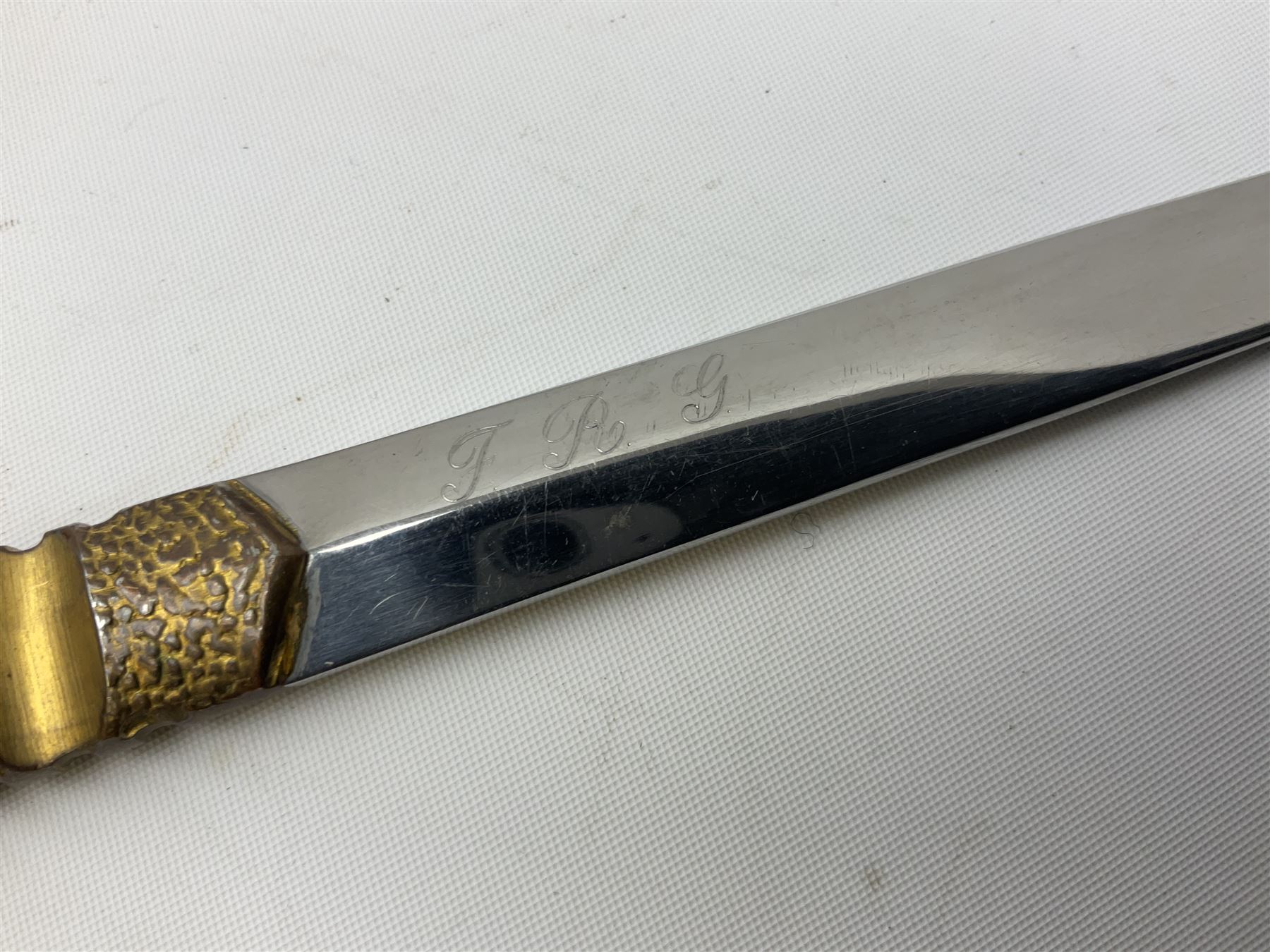 Malayan Kris dagger, the 31.5cm double edged straight heavy damascus blade with copper ferrule; carved hardwood grip; in large wooden throated scabbard with floral decorated white metal covering L47.5cm overall; a kris blade with adapted antler grip; and five various small daggers/letter openers (7)