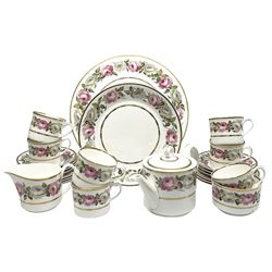 Royal Worcester Royal Garden pattern tea service for seven place settings, comprising teapot, teacups, saucers, side plates, milk jug, open sucrier, cake plate, and cake stand