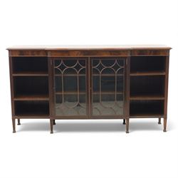 Early 20th century mahogany breakfront bookcase cabinet, the moulded rectangular top above...