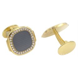 Pair of Patek Philippe Nautilus 18ct yellow gold and diamond cufflinks, with sapphire crystal, black-grey centre and diamond-set front, hallmarked, in original box