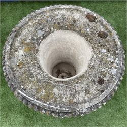 Composite stone campana shaped urn, the body decorated with scrolling foliage, gadroon moulded underside, fluted pedestal support on square base - THIS LOT IS TO BE COLLECTED BY APPOINTMENT FROM DUGGLEBY STORAGE, GREAT HILL, EASTFIELD, SCARBOROUGH, YO11 3TX
