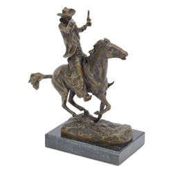 Bronze study of a Cowboy with a shotgun in hand riding galloping horse, upon rectangular m...