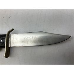 Royal Air Force aircrew survival knife with 10cm Bowie style steel blade marked 'Joseph Rodgers Sheffield England 22C/1996', black grips with twin-sided locking mechanism and lanyard hole to cross-piece; steel scabbard marked 22C/2202 L23cm overall (with photocopies of modern reference material)