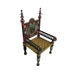 Pakistani armchair, turned frame with all-over painted decoration, rush string seat