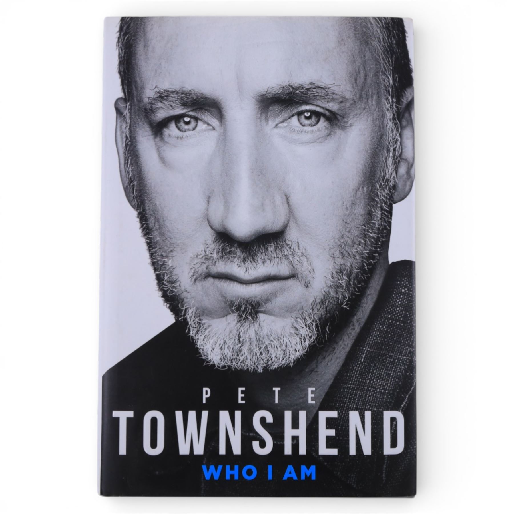 The WHO 'Then & Now' framed album insert, signed by Roger Daltrey and Pete Townshend, The WHO's Pete Townshend signed framed photograph, together with a  first edition of his autobiography 'Who I Am', largest frame H44cm