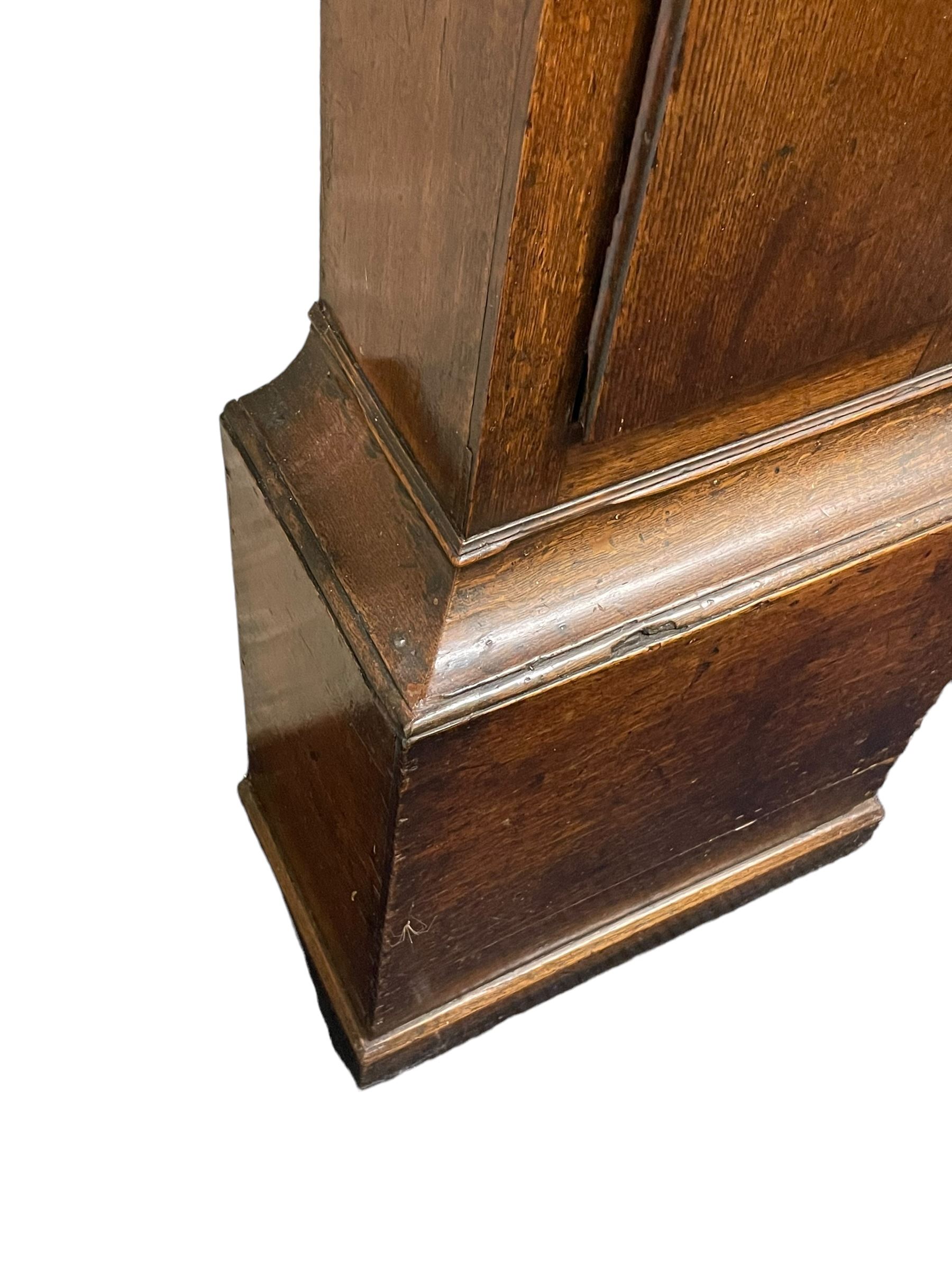 Gilbert Kidd of Malton (North Yorkshire) - late 18th century oak 8-day longcase clock c1780,  with a tall double caddy top and later brass ball and spire finials, break arch hood door beneath with attached pilasters and wooden capitals,  plain trunk with a long flat topped door, raised on a square plinth with applied skirting,  brass break arch dial with the makers name to the silvered boss in the break arch, engraved and silvered dial centre and chapter ring, with cast spandrels and matching steel hands, subsidiary seconds dial and square calendar aperture, dial pinned directly to a rack striking movement with a recoil anchor escapement, sounding the hours on a cast bell. With pendulum and weights.
The Kidd family were a prolific family of provincial clockmakers working in Malton from the mid 18th century until the early 19th century. Many of their clocks are simply signed 