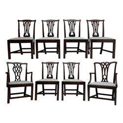 Set of eight (6+2) George III mahogany dining chairs, yoke cresting rail over shaped pierced splat back, drop in seats upholstered in pale blue patterned fabric, raised on square chamfered supports united by stretchers