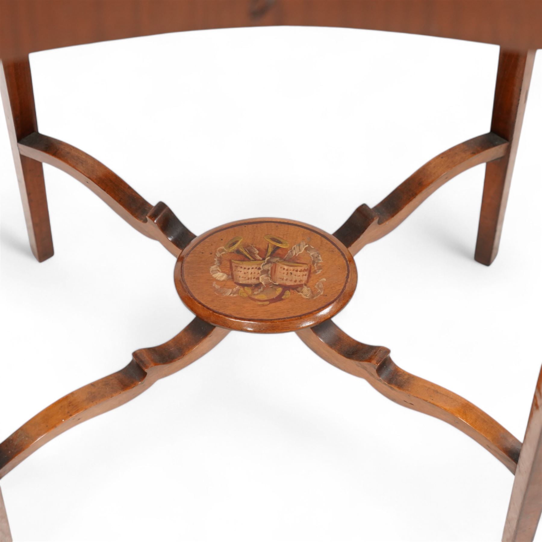 Edwardian satinwood kidney-shaped bijouterie table, hinged lid with glazed panel enclosed by floral painted frame, on square tapering supports decorated with trailing bell flowers, united by shaped stretchers and oval tier painted with ribbon and trumpets 