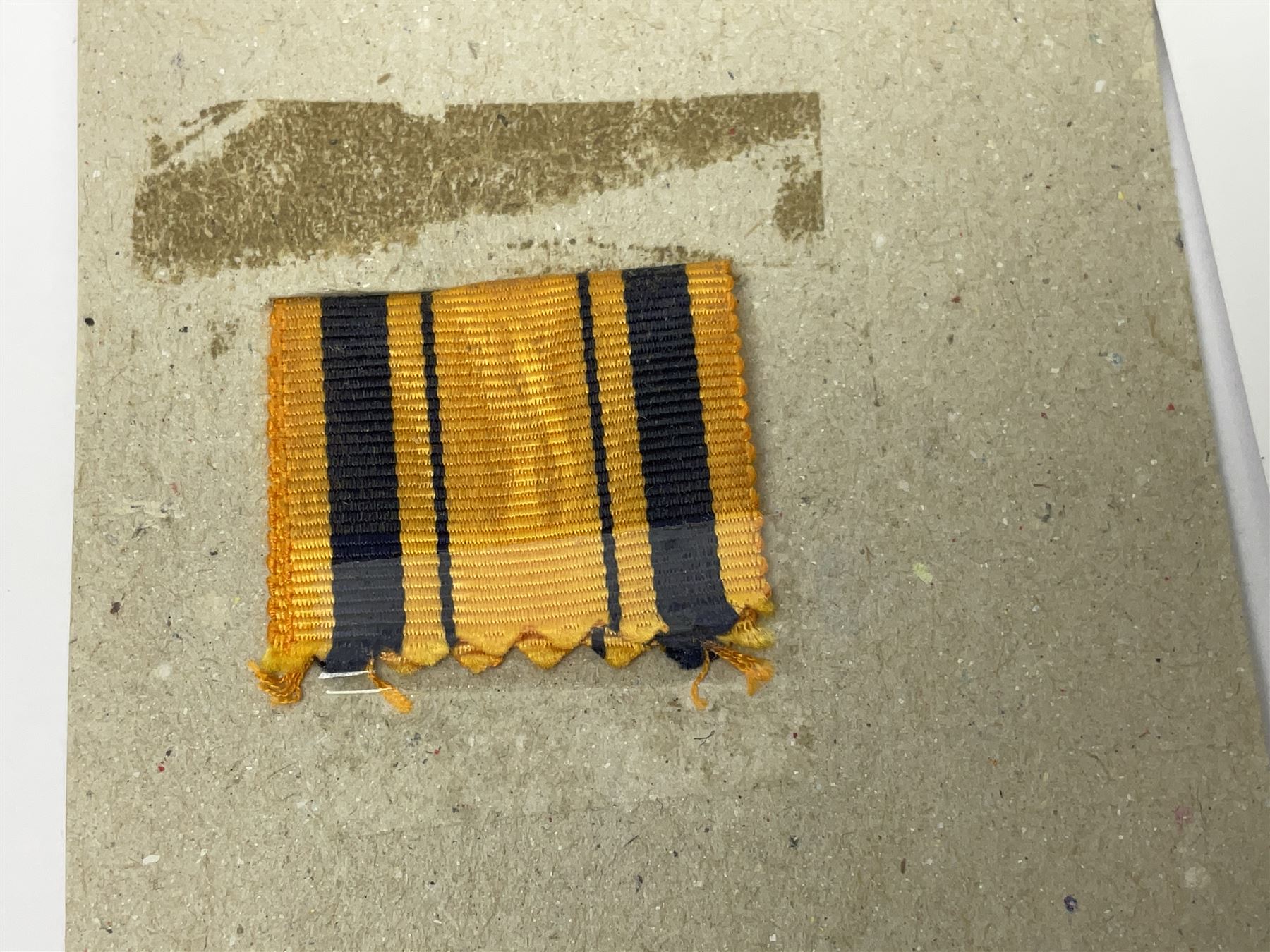 Victoria South Africa Medal (Zulu Wars) 1877-79 with 1879 clasp awarded to 50/544 Pte. T. Noon 57th Foot (West Middlesex regiment); with replacement ribbon but original ribbon present