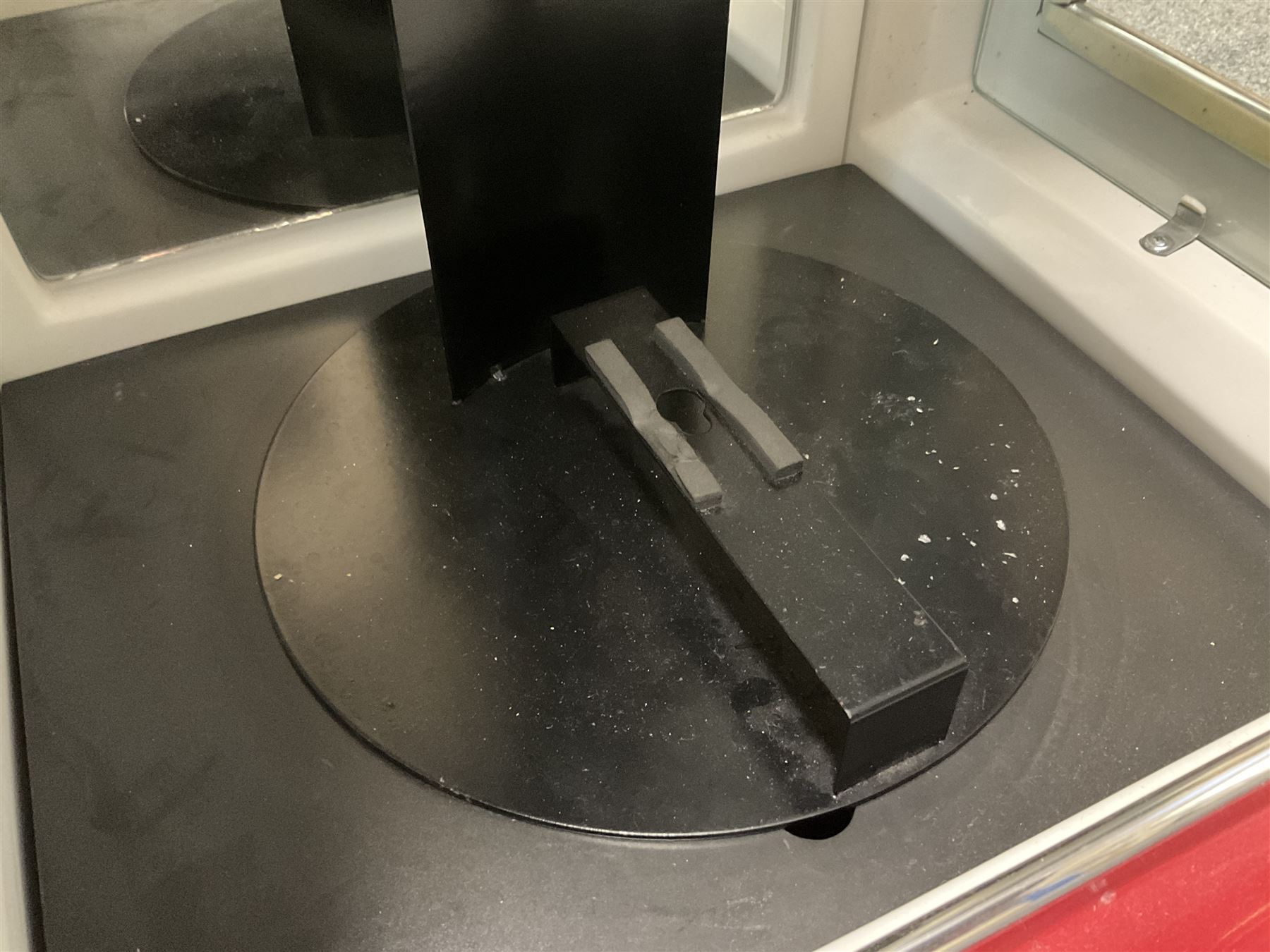 Roadside Relics Fender Custom Shop guitar display case, modelled as an American petrol pump, with a circular two-tone Fender logo light upon the pillar box red cabinet, three sides with glazed panels and chrome detailing, one etched with Fender logo, the interior with removable guitar stand, height including light 184cm