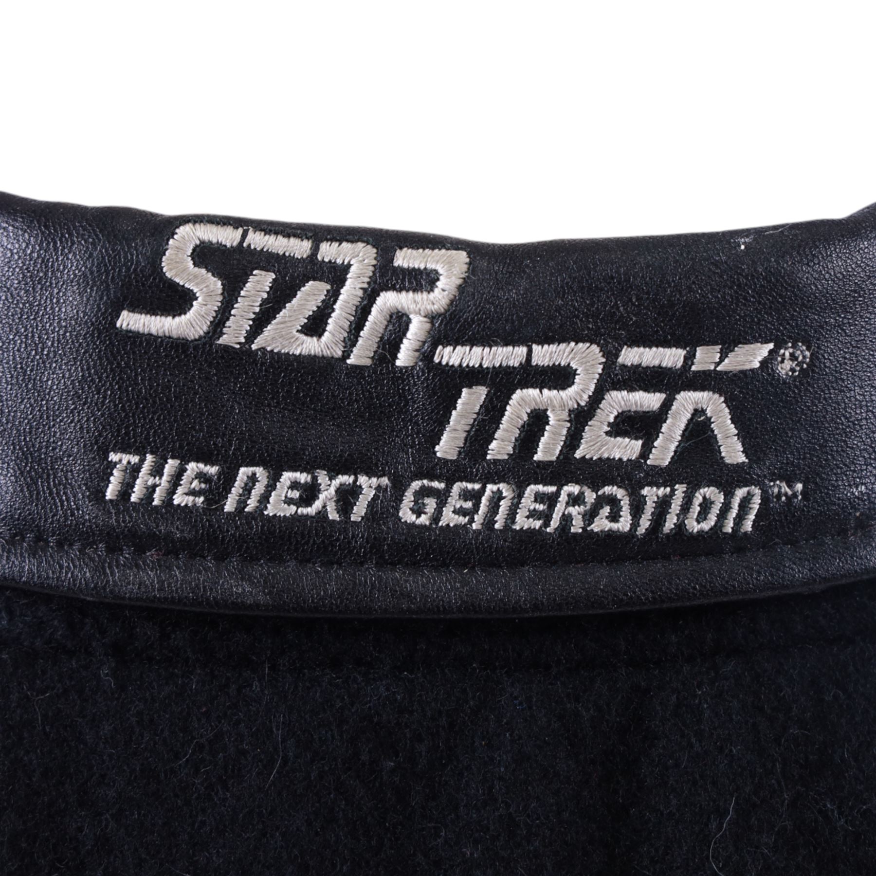 Star Trek The Next Generation 10th anniversary jacket, leather sleeves and collar with embroidered decoration throughout, including 10th anniversary emblem to back, 'Star Trek The Next Generation' to collar, 'Paramount Pictures Stages 8,9 & 16' to front and seven character names to interior, in size XXXXL, purchased in 1990s from Star Trek Experience Las Vegas