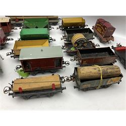 Hornby '0' gauge - sixteen unboxed and playworn goods wagons including bogeyed log carrier, double hopper wagon, side tipping wagons, cable drum wagon, open wagons, flat-truck container carriers, lumber wagons, goods brake vans etc (16)