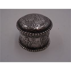 Victorian Dutch silver lidded box, repousse decorated with figural scenes, including putti and animals, with beaded rim, hallmarked Lewis Lewis, London 1892 and impressed with Dutch import marks to base, H3cm, together with a modern silver pill box, decorated in relief with Iris to hinged cover, with London import marks for 1997, a modern silver page marker, with owl finial, with London import marks and a silver chatelaine mirror, unmarked but testing as silver