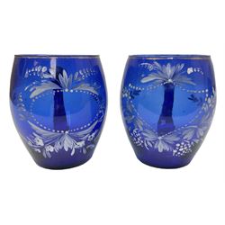 Pair of Victorian cobalt blue glass cups with gilt and painted decoration, entitled Hope's the Balm of Life and Love me as I Love Thee, H8.5cm