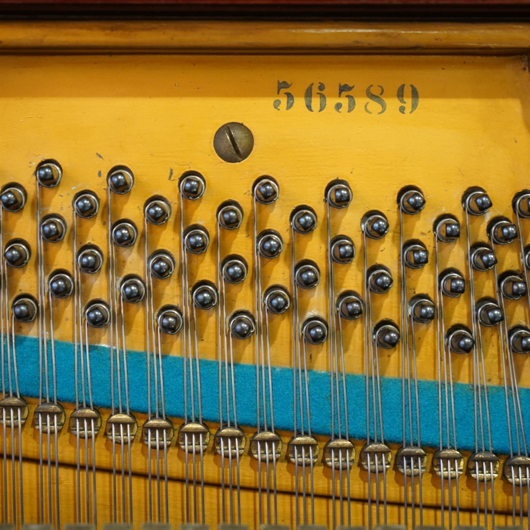 Claud Bechstein- German model IV overstrung upright piano in a mahogany Arts & Crafts designed case by Walter Cave, Serial number 56589 (1900-01), with a lattice music desk and silk backed open fretwork, square key fall with makers name and crafted brass hinges, two candle sconces on tapered square supports, makers name and model number cast into the frame, with an underdamper action, una-corda and sustain pedals, recently re-strung with new tuning pins, responsive action and damping, in very good playing condition, with 85 ivory and ebony keys A0-A7, tuning A=440. Including a period duet stool with a velvet-padded top.
Walter Cave was a leading architect, interior designer, and furniture maker during the Arts & Crafts period, a similar piano to this was owned and played by George Bernard Shaw and is on exhibition at the National Trust property, Shaw's Corner (Hertfordshire).

This item has been registered for sale under section 10 of the APHA Ivory Act, Reference 8P3C9UKA
