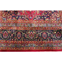  Kashmar red ground rug, central medallion, floral pattern repeating border, 290cm x 190cm  