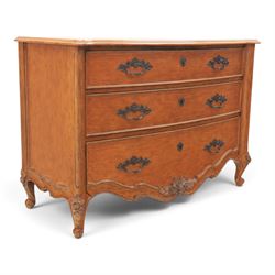 And So To Bed - 'Louis XV' large cherrywood chest, bowed shaped top above three long graduating drawers, blackened metal handles and escutcheons, raised on scrolled supports with carved foliate knees 