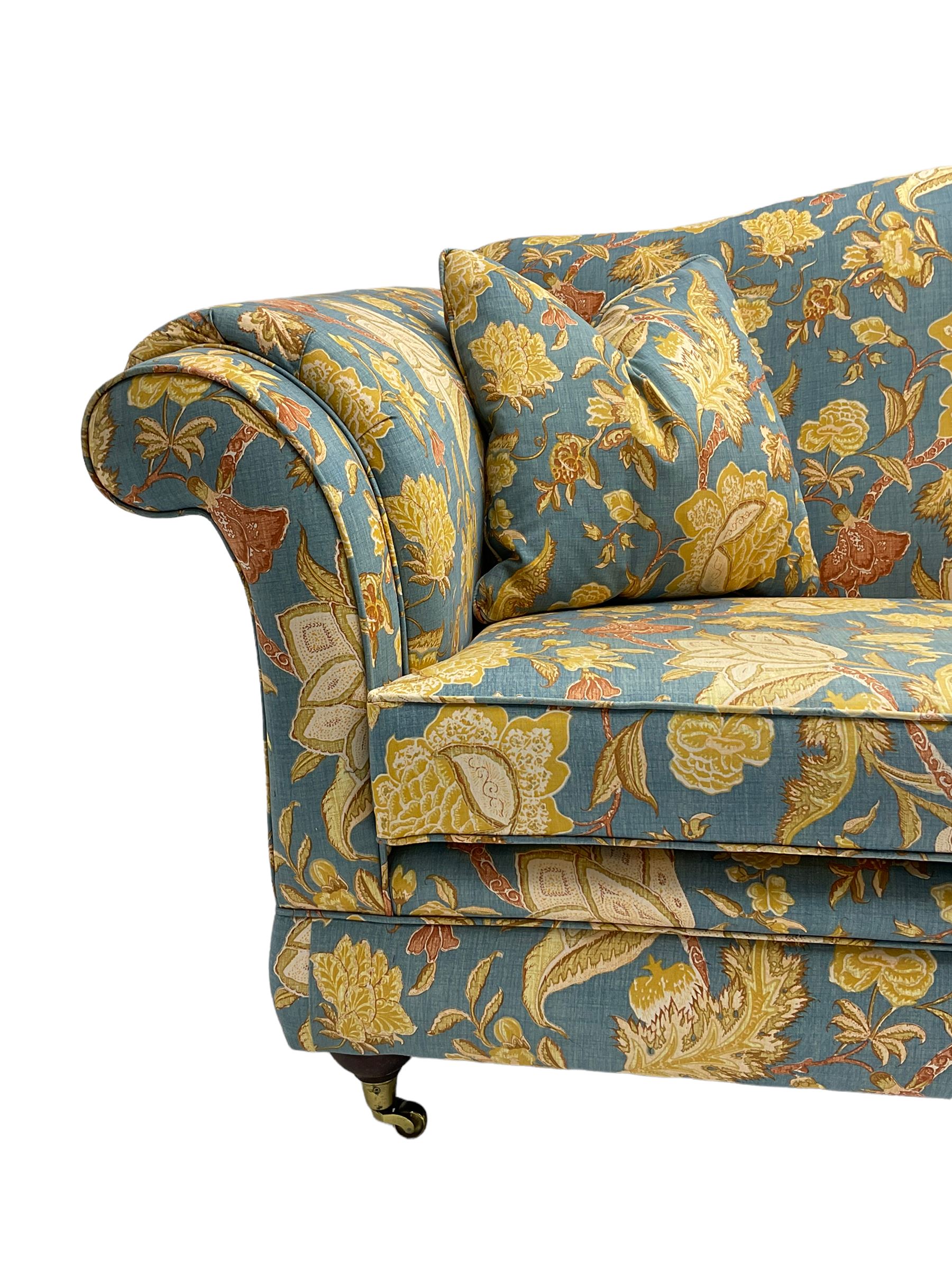 Lincoln House - two seat sofa (W170cm), wingback armchair (W94cm), and armchair (W90cm), upholstered in blue ground fabric with floral pattern