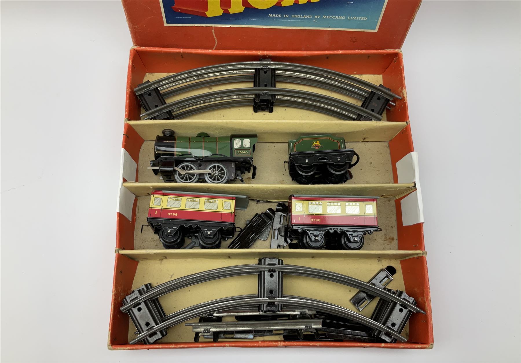 Hornby '0' gauge - Passenger Set No.21 with clockwork No.20 type 0-4-0 tender locomotive No.60985, two coaches and track, boxed; and Tank Passenger Set No.101 for spares or repair with clockwork No.101 type 0-4-0 tank locomotive No.2270, three coaches and track, boxed (2)