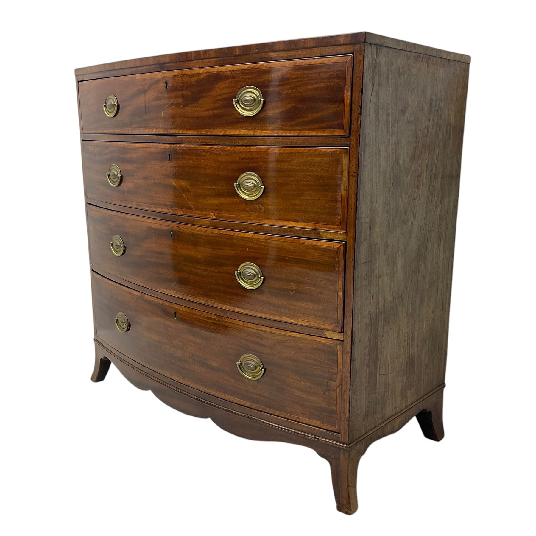 George III mahogany bow-front chest of drawers, four graduated drawers with oval brass handles, raised on splayed bracket feet with a shaped apron