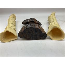 Hardwood bust of an Indoniesian Goddess, carved wearing a pierced headdress, from Klungkung, Bali, H20cm, together with a pair of bone carvings of deity figures, and a carved wood Netsuke in the form of a Chinese dragon