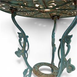 Cast iron garden table and four chairs, in the Art Nouveau style, with pierced floral and foliate decoration throughout, circular table raised on four cabriole legs with stretcher ring, chairs with shaped openwork backs and seats, in a weathered green finish