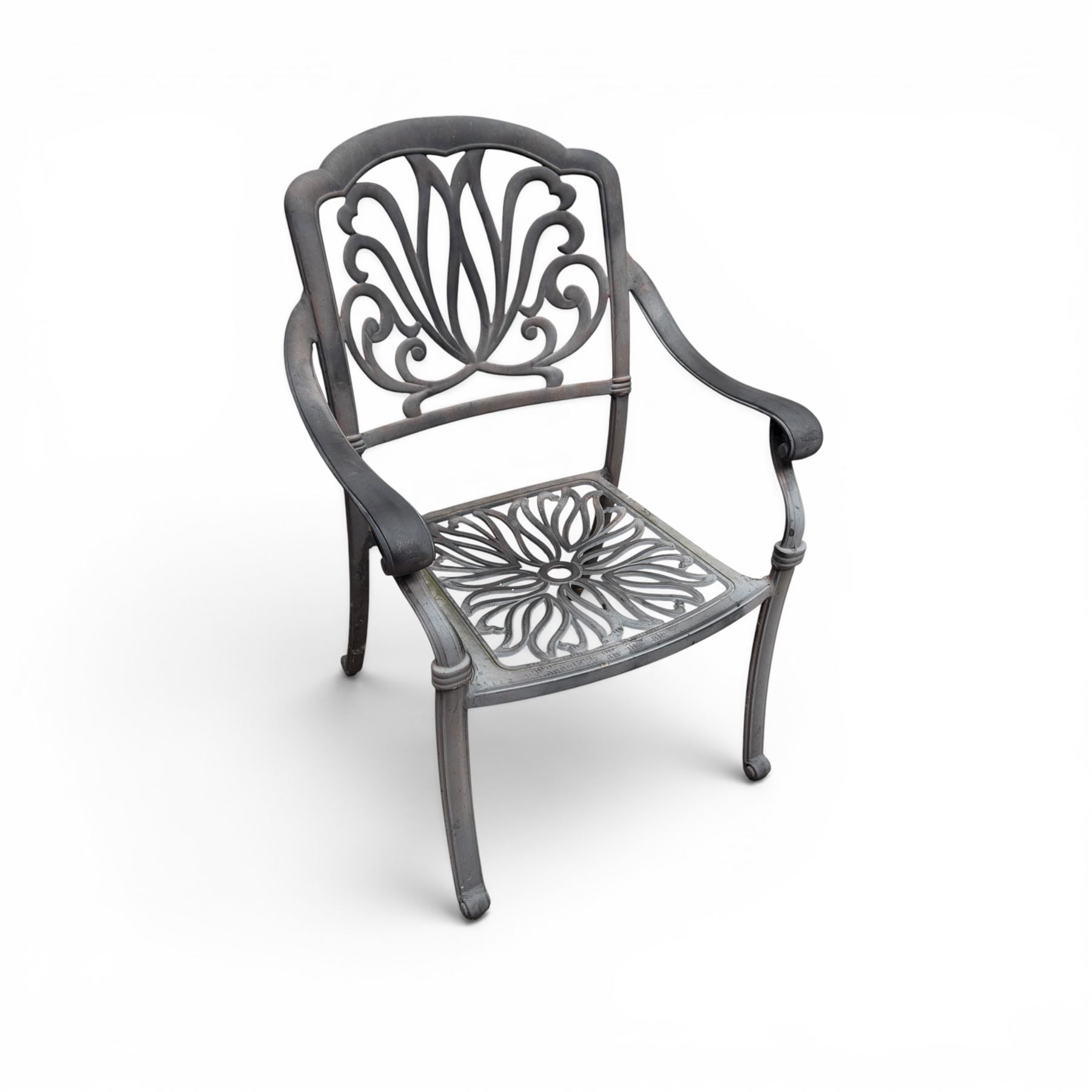 Circular aluminium garden table and pair of armchairs chairs with a pierced and scrolling backs 