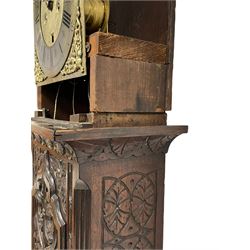 18th-century profusely carved oak longcase clock - with a pagoda pediment, upstands and carving, 
 break arch hood door flanked by reeded pilasters with brass capitals, trunk with canted corners and a spire topped door, square plinth with applied skirting, break arch brass dial with wheatsheaf engraving and cast cherub and crown spandrels, engraved break arch with the London clockmakers name John Gordin, silvered chapter ring with Roman numerals, five minute Arabic's, minute and quarter hour tracks, matted dial centre with ringed winding holes, square date aperture and seconds ring, dial pinned to a five pillar movement with inside countwheel striking, striking the hours on a cast bell. With weights and pendulum. John Gordin, is possibly a mis-spelling or phonetic spelling of John Gordon, of London, who worked from Ludgate Street in the parish of St. Gregory by St. Pauls. Apprenticed in 1689 and died in 1732 when his will was proven.
