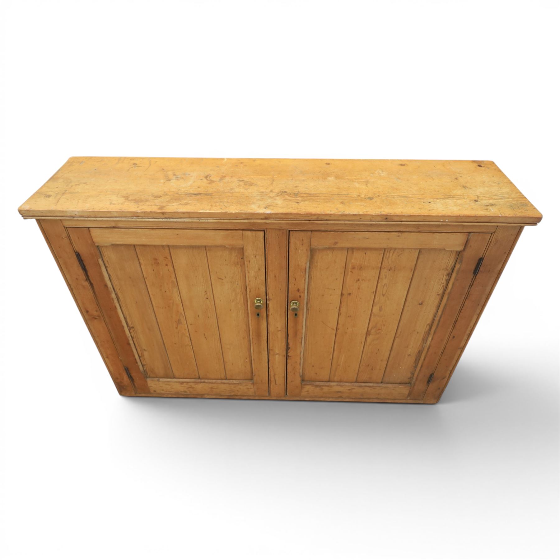 Victorian waxed pine low cupboard, fitted with two panelled doors and panelled sides, two interior shelves