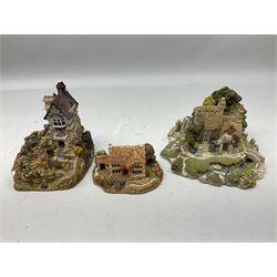 Forty six Lilliput Lane model cottages, to include 'Convent in the Woods', 'Holme Dyke' 'Secret Garden' etc