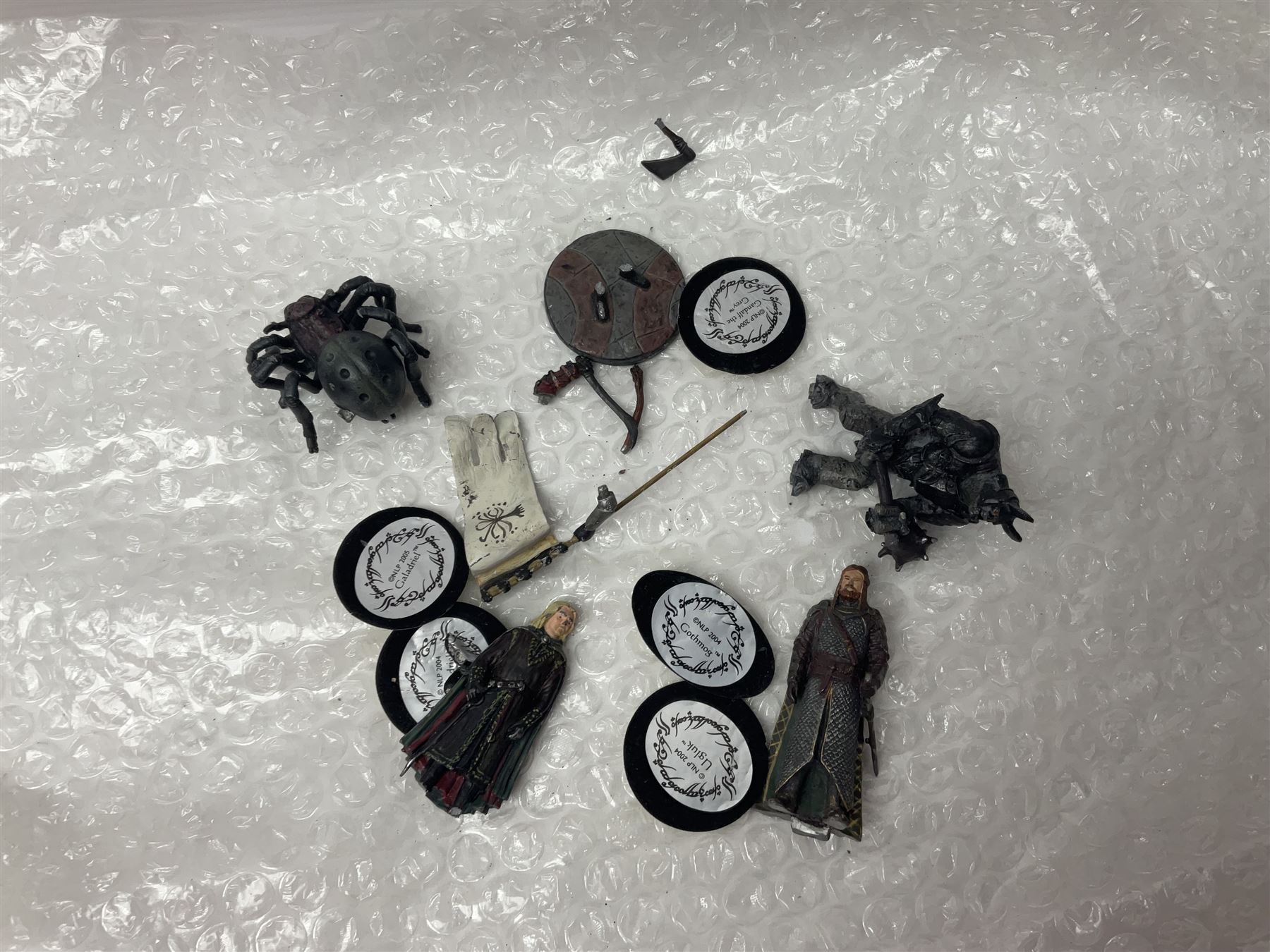 Approximately 80 NLP Lord of the Rings heavy metal painted figurines to include Fell Beast, boxed, and The Watcher, The Dark Lord Sauron, Treebeard etc, and unassociated Dracula themed composite figures marked HHFT50 