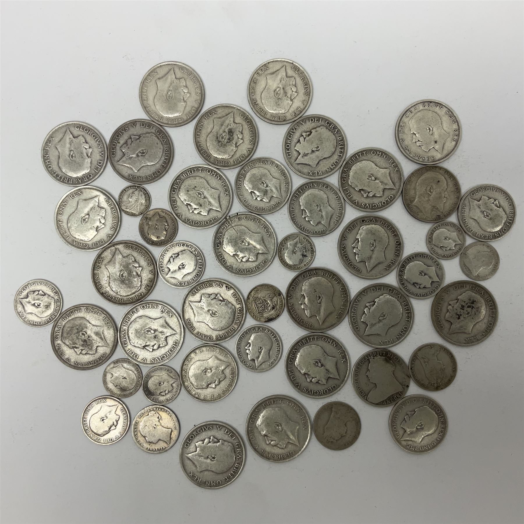 Approximately 440 grams of Great British pre 1920 silver coins, including various King George V halfcrowns etc