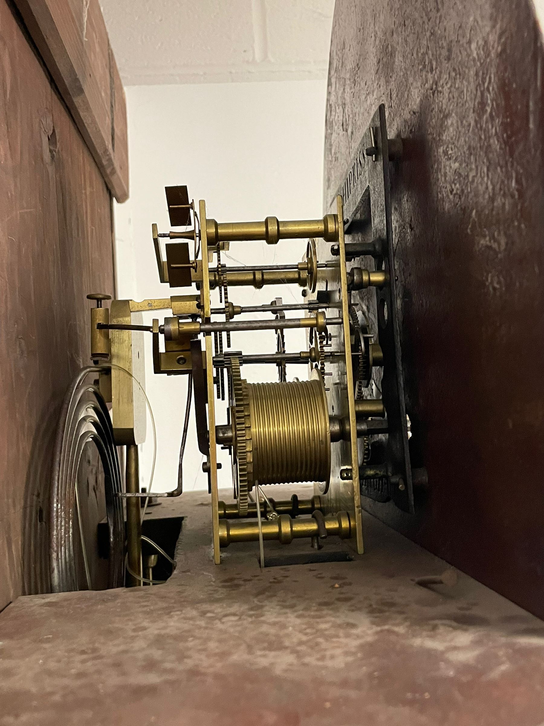 John Stonehouse of Leeds - mahogany 8-day longcase clock with a painted oval dial c1830, hood with a swans necked pediment and profuse contrasting inlay to both the hood and case, oval hood door with flanking pilasters and Corinthian capitals, conforming case with canted corners and short triple spire door, broad plinth with matching inlay and canted corners on shallow base, dial depicting masonic regalia, symbols, and pictorial depictions of the humanities, faith, hope, charity and righteousness, black chapter with white roman Arabic’s, date recorder and matching “crown” hands, dial pinned to a rack striking movement with a recoil anchor escapement, striking the hours on a coiled underslung gong. With weights and gridiron pendulum. 
This clock case is of large, impressive dimensions and was almost certainly commissioned for a large masonic lodge in Leeds, a rare and unique example.