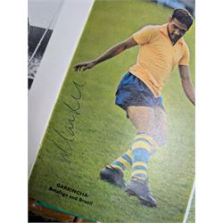 'World Cup 1966 England' hardback book, signed to inner front page by thirteen legendary footballers, to include Bobby Moore, Pele, George Cohen, Bobby Charlton, Alan Ball, Nobby Stiles, Roger Hunt, Peter Thompson, Kenneth Wolstenholme, Jairzinho, Garrincha, Martin Peters and Geoff Hurst, with certificate of authenticity from Chaucer Auctions