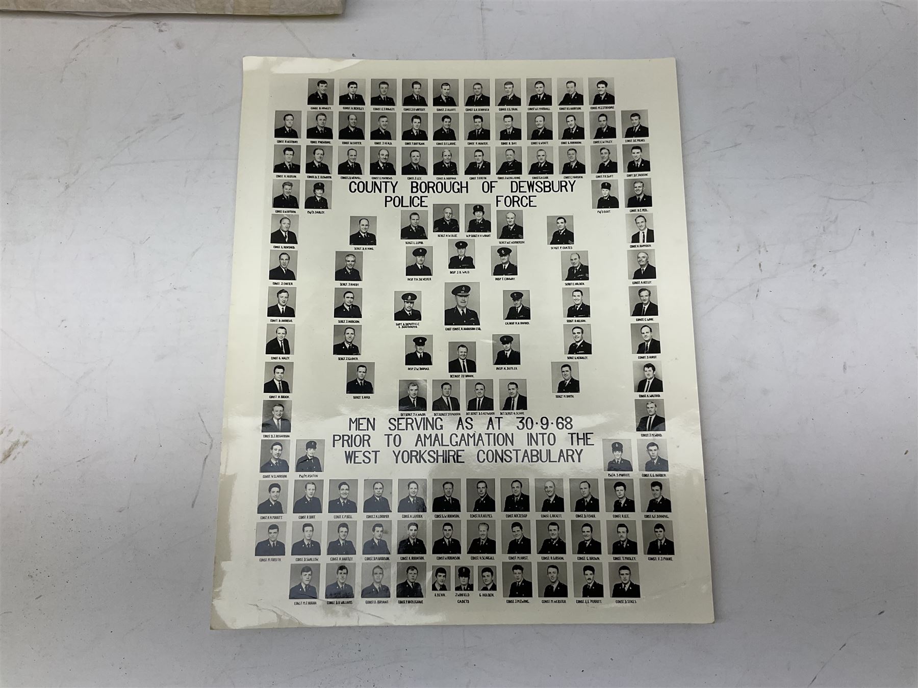 Archive of memorabilia and ephemera relating to Pc. (later Sgt.) Geoffrey Robinson of Dewsbury (later West Yorkshire) police force including cased Long Service and Good Conduct Medal; helmet plates and cap badges, collar numbers and uniform buttons, whistles, certificates, photographs, plaque etc 1960s - 1990s