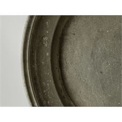 Collection of 18th and 19th century pewter, comprising two chargers, eight large plates, twenty six smaller plates, two bowls, three lidded measures, two jugs, tappit hen, and tankard, the plates with various marks and touch marks, including pseudo 'hallmarks', largest charger 37cm, large plates D30cm, smaller plates D24.5cm, tappit hen H26.5cm