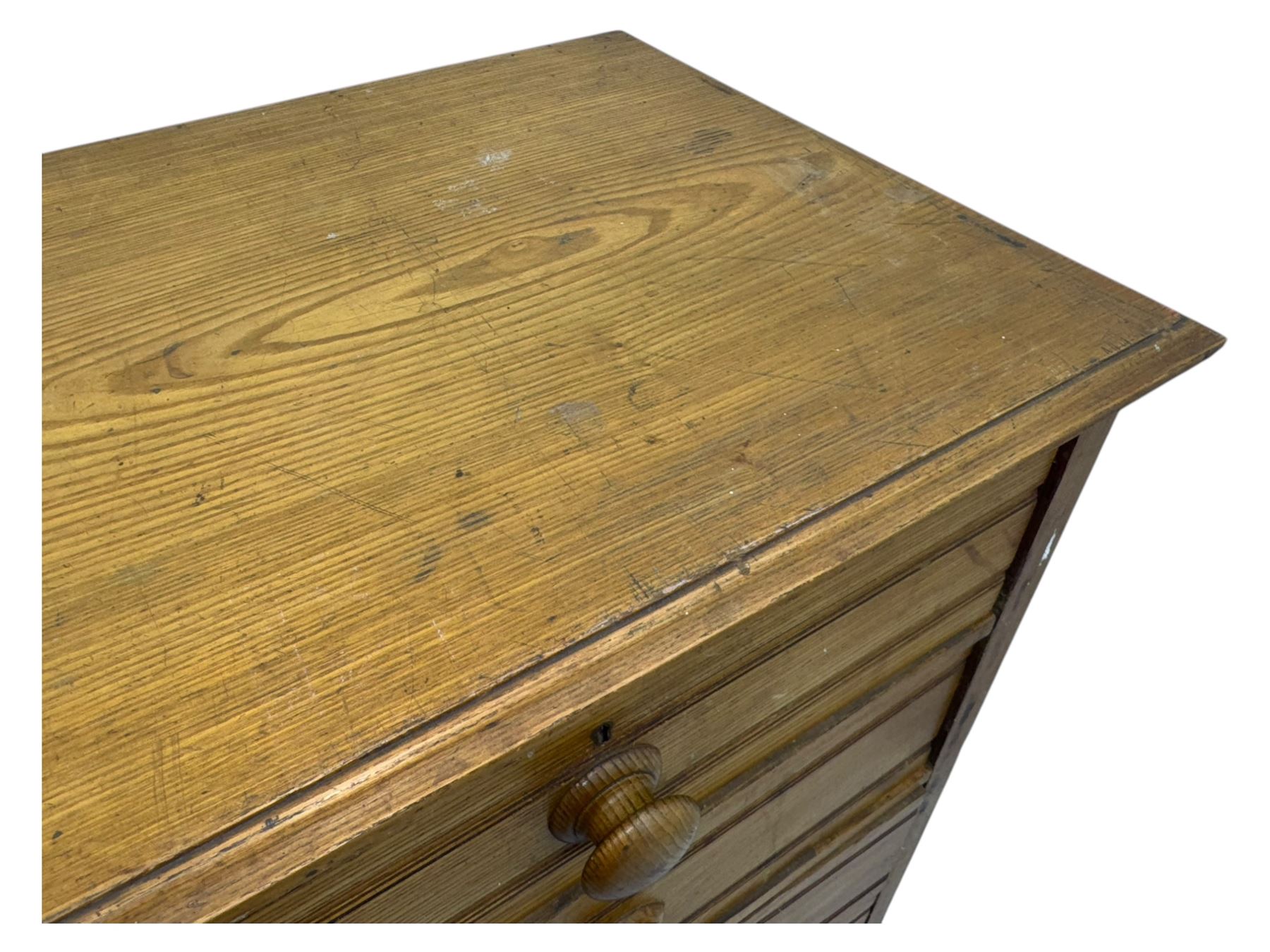 Late 19th century ash chest, fitted with two short and four long drawers, turned wooden handles