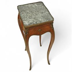 Early 20th century French kingwood and ormolu mounted lamp table, the shaped top inset with green marble above a single locking frieze drawer and pull-out slide, raised on slender cabriole legs with gilt sabots