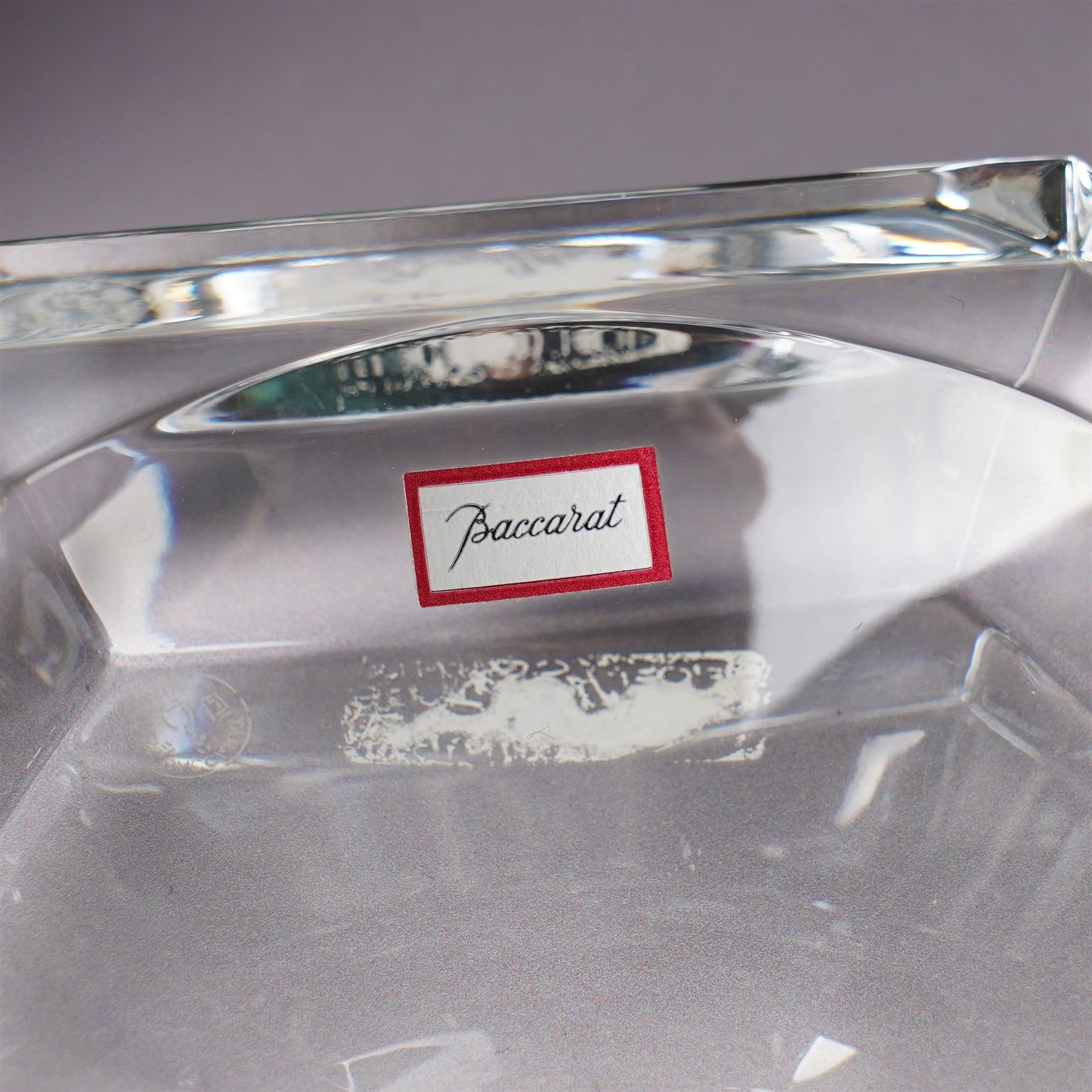 Collection of Baccarat Crystal, comprising a 'Pluton' decanter and two smaller examples, two covered condiment jars, pair of salt cellars, and an ashtray, variously boxed
