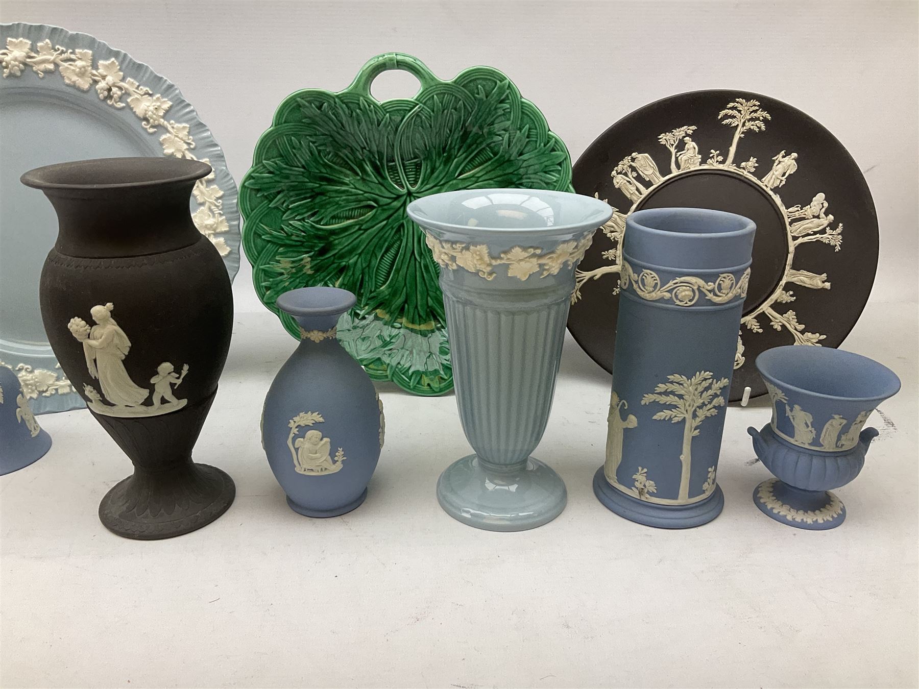 Collection of Wedgwood, to include queensware pattern fluted vase and plate, green majolica leaf dish, Jasperware in blue, green and black, to include covered trinket boxes, vases, plates etc   