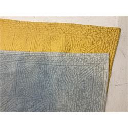Early 20th century Welsh whole cloth sky blue quilt, in traditional quilting patterns, supported on yellow coloured backing, 174cm x 204cm