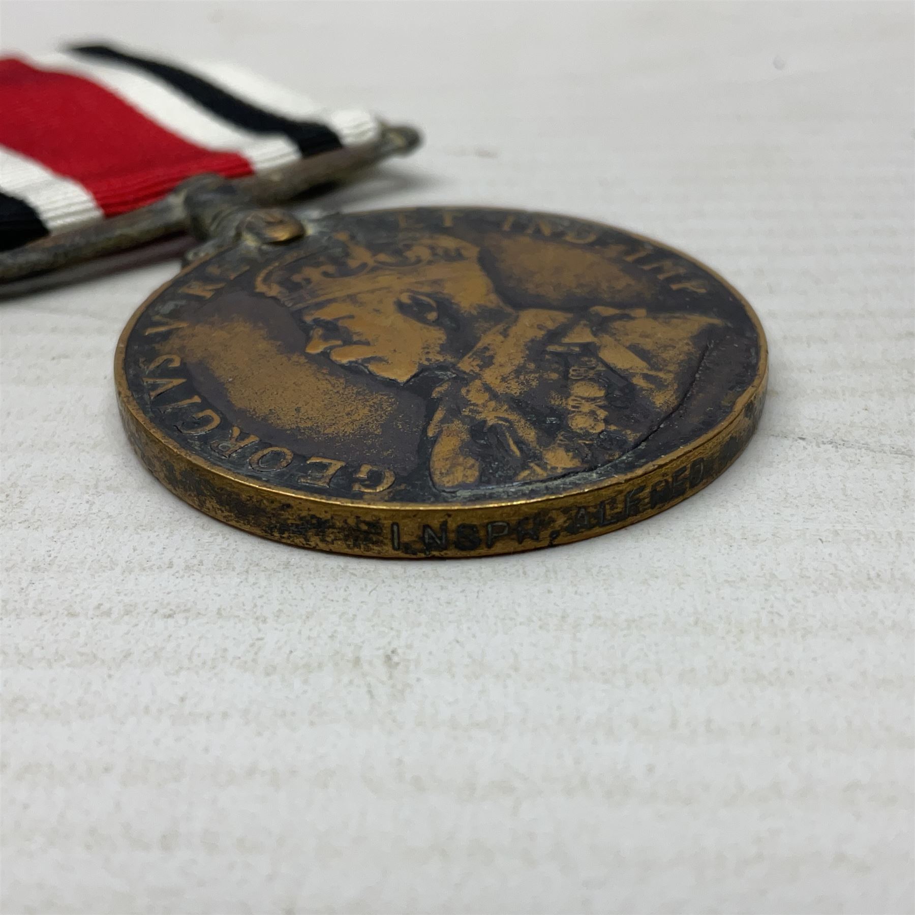 Two Imperial Service Medals to Elsie Hannah Ferguson and Fred Whitehead; each in original case; WWI Special Constabulary Medal to Inspr. Alfred W. Thompson; modern Prisoner of War Medal; cased; replica Victoria Cross and India Mutiny Medals with archive of information relating to Pte. Robert Newell V.C. 9th Lancers; replica Victoria Cross and George Cross with miniatures; and other replica medals etc