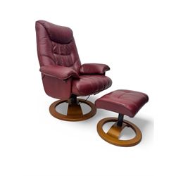 Contemporary burgundy leather reclining armchair and footstool, featuring segmented upholstered cushions and padded armrests, each piece mounted on a circular laminated wood base