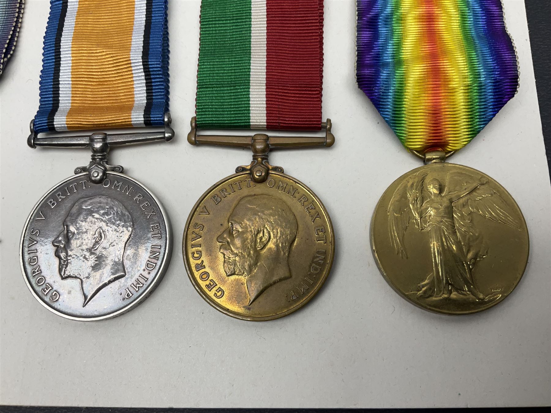 Representative display of five WWI Campaign Stars and Medals to different recipients comprising 1914 'Mons' Star to 13800 Gnr. R. Pexman R.F.A.; 1914-15 Star to TS822 F. Bage T.R. R.N.R.; British War Medal to 90461 Dvr. A.A. Cross R.A.; Mercantile Marine Medal to Patrick J. Magrath; and Victory Medal to 2657 Cpl. W.R. Kenny Norf. Yeo.; all with ribbons (5)