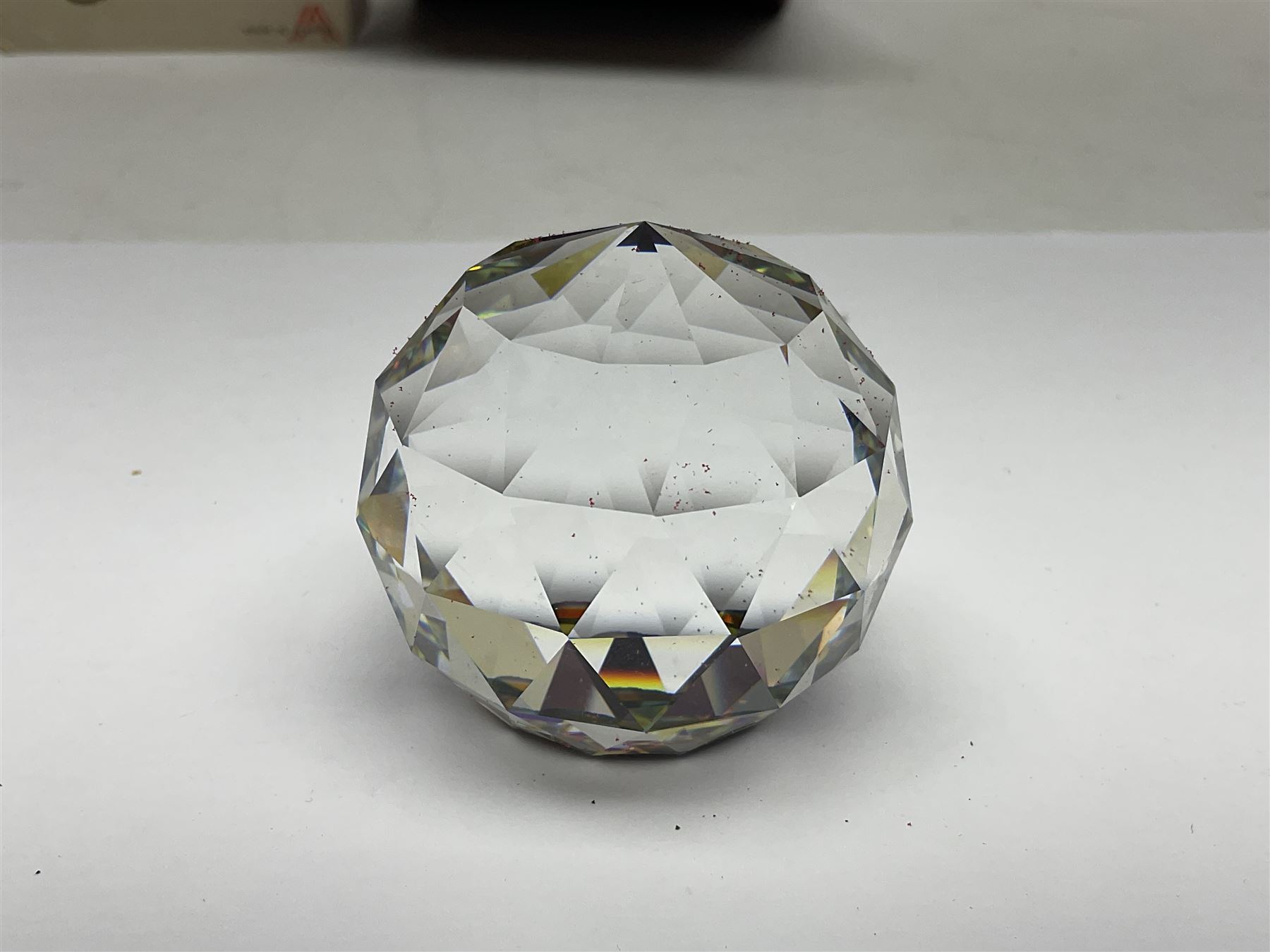 Three fountain pens, to include Conway Stewart 'Dinkie 550' and 'Conway 57' and a Parker 'Slimfold', all with 14ct gold nibs, together two roller ball pens, including a Parker example and a Swarovski Crystal paperweight