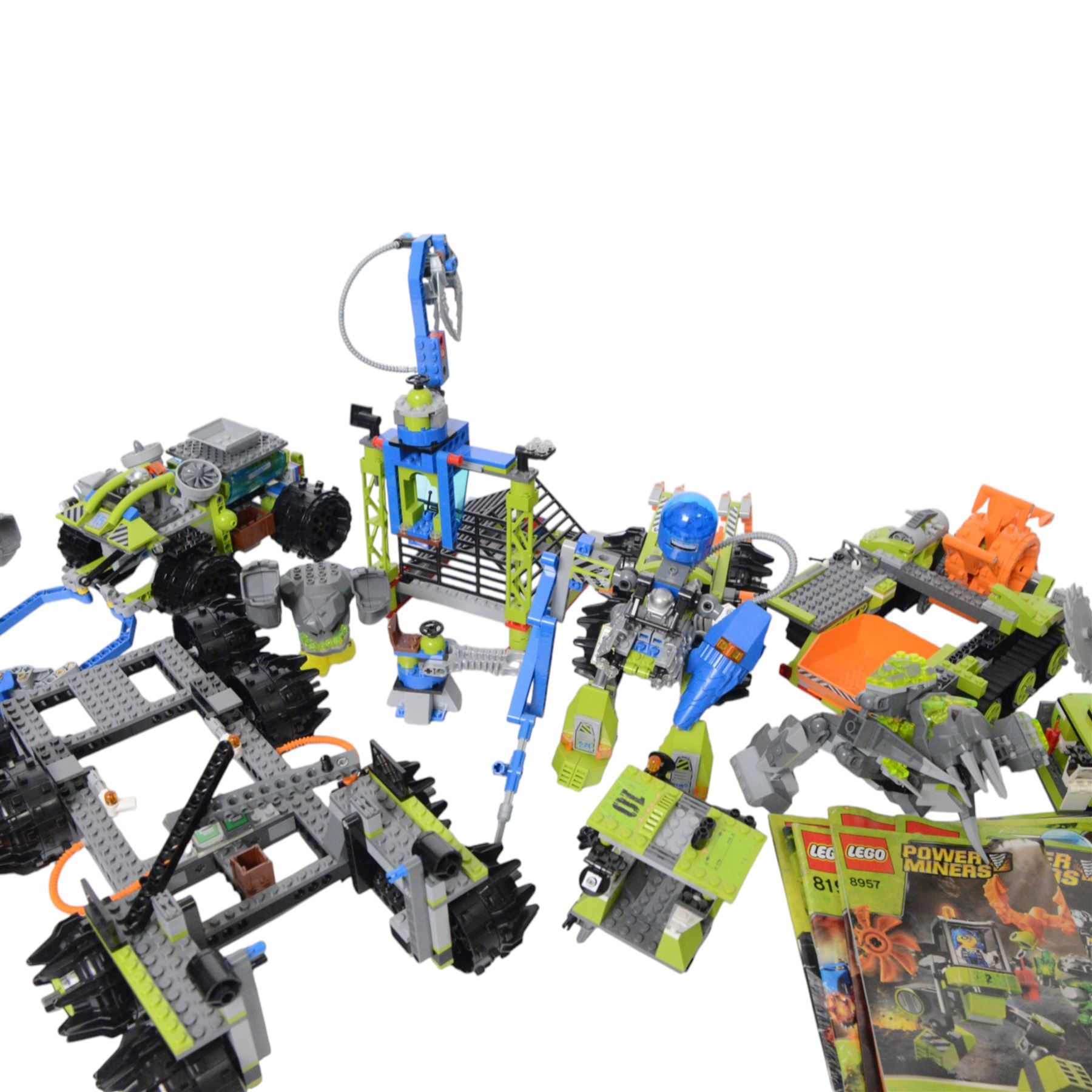 Lego Power Miners sets, including 8957, 8964, 8958, 8190, 8189, 8961 and 8963, all partially built with instructions